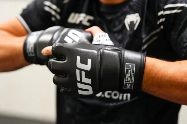 MMA-Fighter-putting-on-and-fitting-the-new-UFC-Fight-Gloves